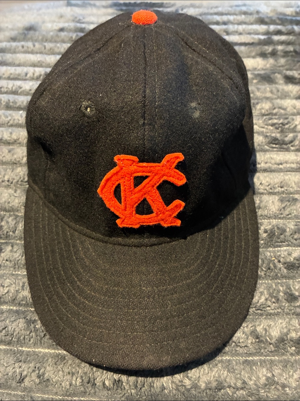 The Game Black Baseball Cap with Green Undervisor
